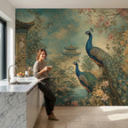 Peel and stick chinoiserie wallpaper installed in a bright living room with boho wall decor styling