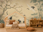 Bird wallpaper swatch held by hand to show true color and texture of the vintage floral crane print