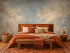 Hand peeling backing from removable wallpaper panel revealing angelic cloud wall decor pattern