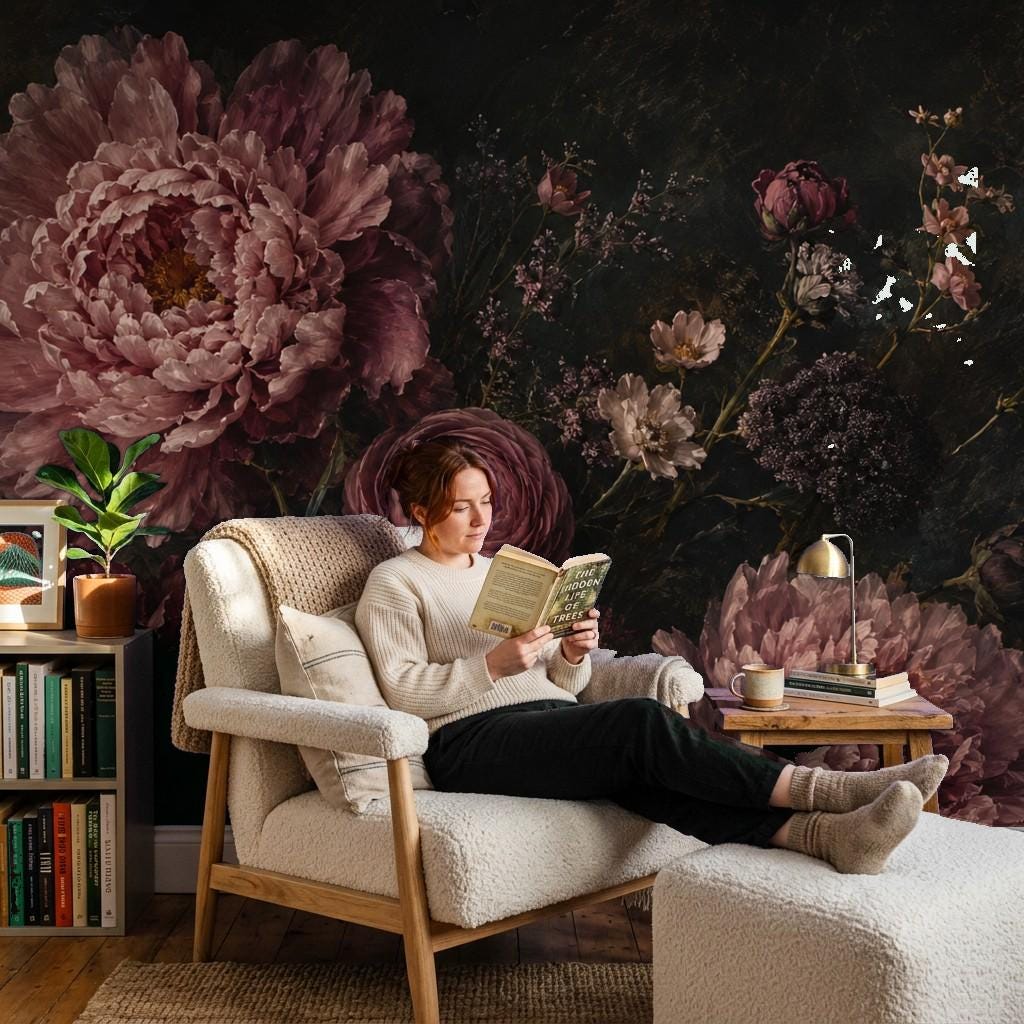 Removable dark flower mural installed in a cozy bedroom creating a lush vintage floral wall statement