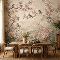 Chinoiserie bird wallpaper with blush pink peonies and cherry blossom branches on soft cream background