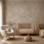 Close view of mushroom beige plaster wallpaper texture showing subtle variation and organic modern surface detail