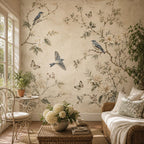Vintage botanical bird wallpaper featuring bluebirds and butterflies in a romantic cottagecore floral mural design