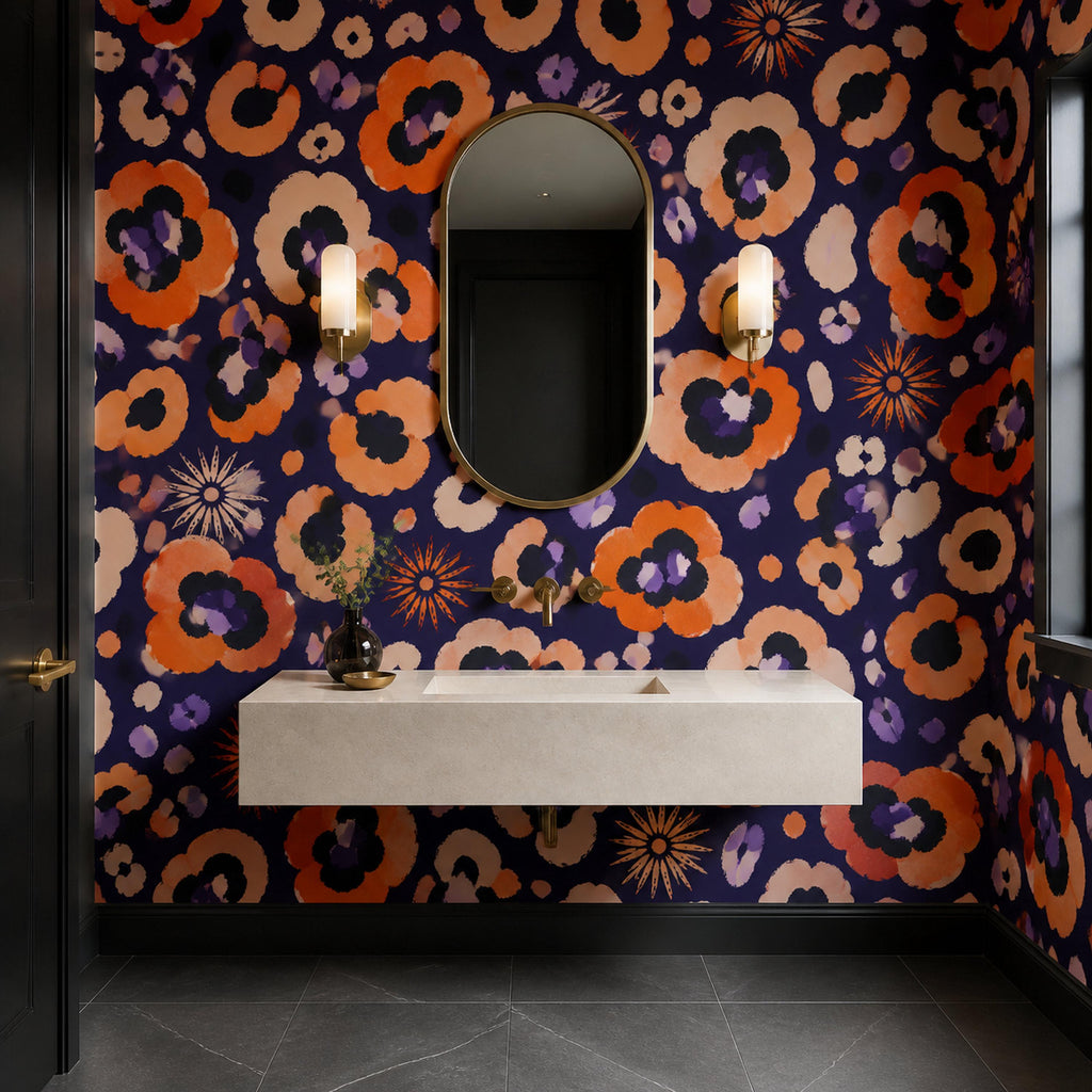 Indigo ocelot leopard print wallpaper in a powder room with a floating stone sink and two wall sconces