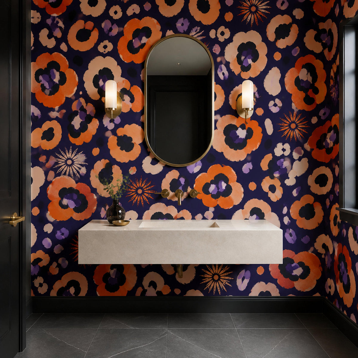 Indigo ocelot leopard print wallpaper in a powder room with a floating stone sink and two wall sconces