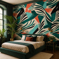 Single strip of abstract zebra wallpaper in emerald and coral teal pinned against a white wall for scale