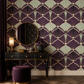 Removable purple art deco wallpaper in a glam powder room with marble fixtures and vintage brass hardware