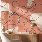 Abstract coral line wallpaper mural adding modern decor to a chic fashion boutique interior