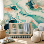 Teal abstract wave wallpaper mural in a nursery with a wooden crib and knit pouf