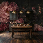 Close-up texture of botanical wallpaper showing rich dark floral print with detailed petals and layered leaves