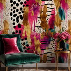 Peel and stick abstract wall mural featuring sweeping pink and gold brushstrokes on a modern accent wall