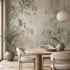 Close-up of botanical branch wallpaper showing soft sage green tones and organic modern leaf detail on wall