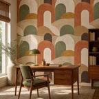 Modern retro decor dining nook with sage and terracotta arch wallpaper on statement wall