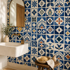 Close-up of blue Moroccan tile wallpaper showing intricate geometric zellige pattern detail