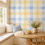 Blue gingham peel and stick wallpaper close up showing hand painted watercolor texture and yellow blue color tones