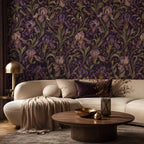 Art Nouveau iris wallpaper in a living room with a curved cream sofa and round wooden coffee table