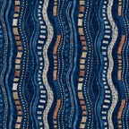 Afrohemian indigo mudcloth wallpaper close-up of the wavy stripe pattern in indigo, rust and cream