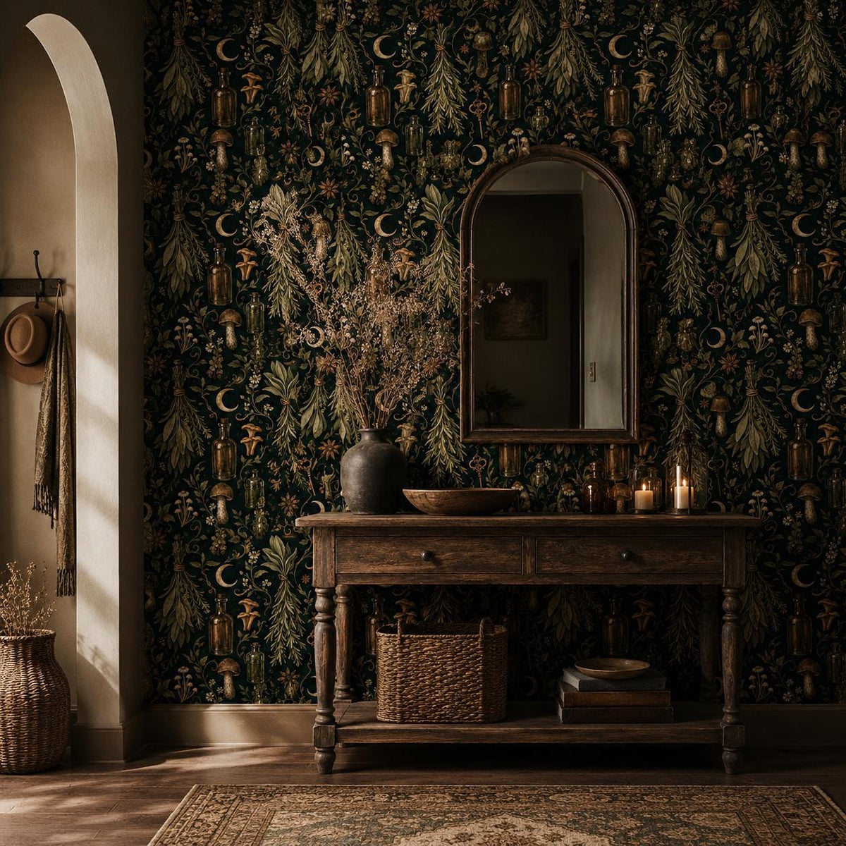 Kitchen witch dark botanical wallpaper in an entryway with a wooden console, arched mirror and dried flowers