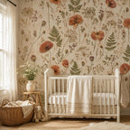 Pressed flower wallpaper in a nursery with a white crib, woven basket and plush bunny