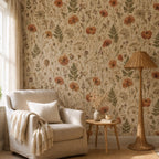 Pressed flower wallpaper in a reading corner with a cream armchair and rattan floor lamp