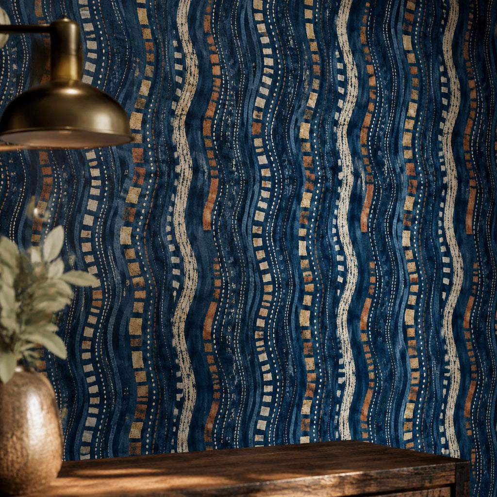 Afrohemian indigo mudcloth wallpaper close-up of the wall with a brass pendant light and a vase on a wooden table