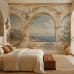 Greek fresco Aegean arch mural in a bedroom with linen bedding and a rust velvet bench, side view