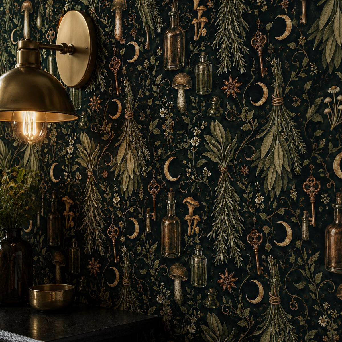 Kitchen witch dark botanical wallpaper close-up with a brass wall sconce lighting the print