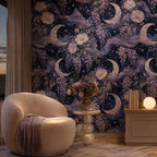 Celestial moon and wisteria wallpaper in a sitting corner with a round boucle armchair and globe lamp